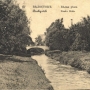 Rzeka Biała z mostem na ulicy Prudskiej (obecnie Świętojańskiej) na pocztówce z 1910 r.